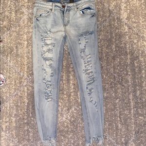 Light blue ripped jeans
